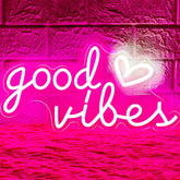HOHOSIGN Good Vibes pink heart neon sign glows softly for a cozy bedroom vibe