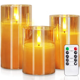 Homemory amber glass flameless candle with remote enhances ambiance.