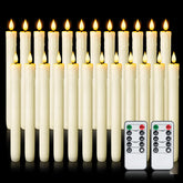 Homemory real wax flameless taper candle with remote glow on a windowsill