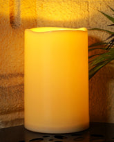 Homemory outdoor candle 6x9 ivory in lantern creates weatherproof outdoor ambiance.