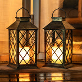 Homemory solar lanterns glow on a bronze porch at dusk for inviting ambience.