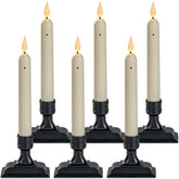 Homemory window candle dusk-to-dawn sensor glows softly in a festive window.