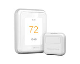 Honeywell Home T9 on wall with clear display for precise room control.