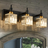 HUOKU crystal vanity light above mirror with brass accents for refined radiance