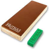 Hutsuls leather strop finishing a chef's knife edge.