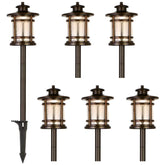 Hykolity low voltage orb LED light with crackled shade illuminating a walkway.
