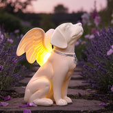 iHeartDogs dog memorial angel statue in garden offers peaceful remembrance.