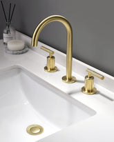 Indare brushed gold faucet with 360° swivel spout for versatile washing.