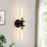 Indoi black and gold wall sconce with clear glass shade for elegant bathroom lighting
