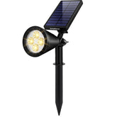 InnoGear solar spot light on a flagpole highlighting the flag with warm white glow