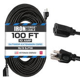Iron Forge Cable 100 ft extension cord in outdoor use, ready for outdoor power tasks.