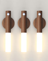 iThird battery motion sensor night light mounted on base for hands-free hallway illumination.