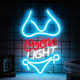 JFLLamp Bikini Crs Light neon sign glowing on wall in Azure, Red and White.