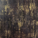 JiffDiff wallpaper roll close-up reveals black and gold metallic pattern for premium accents.