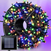 JMEXSUSS 600 LED solar Christmas lights outdoors illuminate spaces with vibrant color for festive décor.