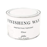 Jolie Clear Finishing Wax bottle close-up showing odor-free protection for furniture