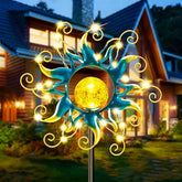 Kacux solar garden globe stake lights up pathways with a warm glow.