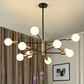 KAISITE 10 light sputnik chandelier over table offering elegant dining ambiance