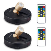 KANESIKI Spotlight puck light pack-2 illuminating artwork with battery-powered ease.