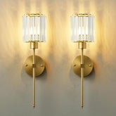KARTOOSH crystal wall sconce in brass finish with clear crystals for elegant hallways.