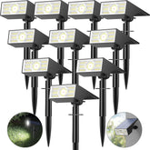 Katipeal 56-LED solar spotlight lighting a yard with bright, efficient illumination