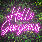 Kavaas Hello Gorgeous pink neon sign on wall enhances bedroom decor with vibrant glow