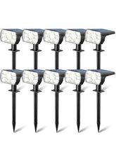Kaxiida Solar Lights front view showing sleek design and pathway illumination.