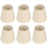 Kenqulio clip-on lampshade on a candelabra bulb softens light for a cozy living room.