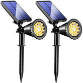 KEV 800-lumen solar spot light brightening the yard and garden