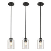 KLSS black seed glass pendant lights in a 3-pack over a modern kitchen island