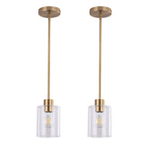 KLSS brass pendant light with clear glass shade over a kitchen island.