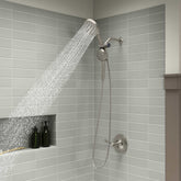 Kohler Prone PowerSweep handshower in action for deep cleaning shower walls