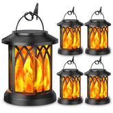 KOOPER 4-pack solar lanterns with dancing flame for elegant outdoor lighting.