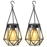 KOOPER diamond hanging lantern on a tree provides warm outdoor ambiance