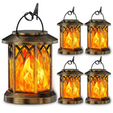 KOOPER solar lantern with dancing flame lights the outdoor path
