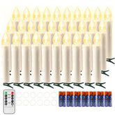koopower 30 LED candles illuminate a Christmas tree with warm, flameless flicker