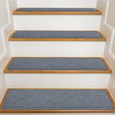 KOOTETA dark-grey stair treads on wooden stairs improve grip and comfort.