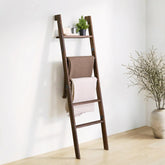 KOSKOG blanket ladder with top shelf displaying throws and decor for organized living spaces.