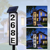 Koyopepi solar address sign on a ground stake boosts daytime and nighttime visibility.
