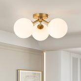 Kunlinzhu mid-century gold semi flush three globe shades create warm entryway illumination.