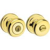 Kwikset Juno keyed entry knob with polished brass, front view for exterior security