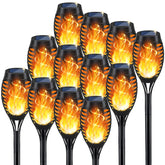 KYEKIO solar torch light with dancing flame creates outdoor ambiance.