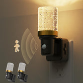 L LOHAS LED motion sensor night light plugged in bathroom for hands-free illumination.