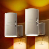 LOHAS LED Amber Night Light casts warm amber glow for cozy nights.