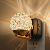 L LOHAS LED night light with honeycomb shade delivers soft ambient illumination.