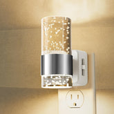L LOHAS LED Night Light plugs into outlet for safe, low-glow illumination.