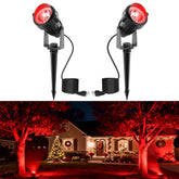 L LOHAS LED red spotlight highlights a front-yard tree for festive curb appeal.