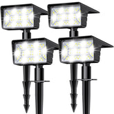 LAMKEEP solar spot light with 60 LEDs lighting a garden path
