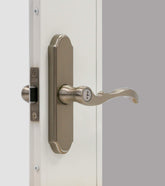 Larson M2 brushed nickel storm door handle set front view showing modern finish and build.