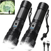 LBE 90,000-lumen flashlight beam lights up a wide outdoor area.